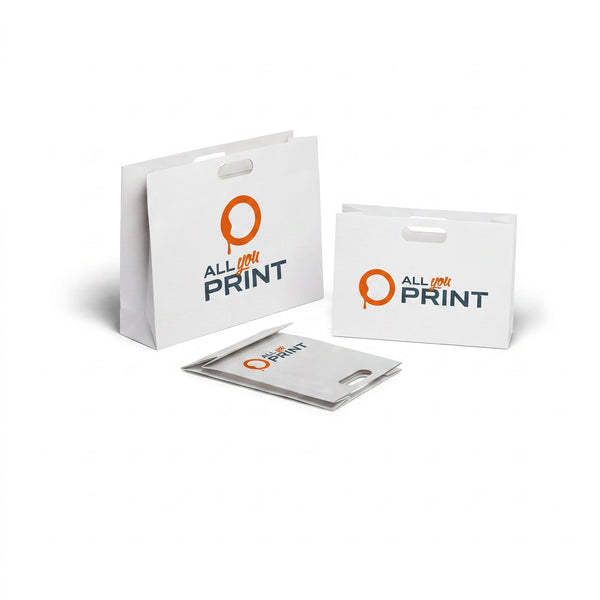 Punched handle carrier bags
