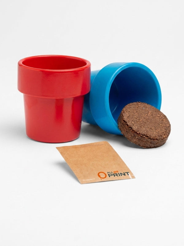 Sample plant seeds in a coffee cup