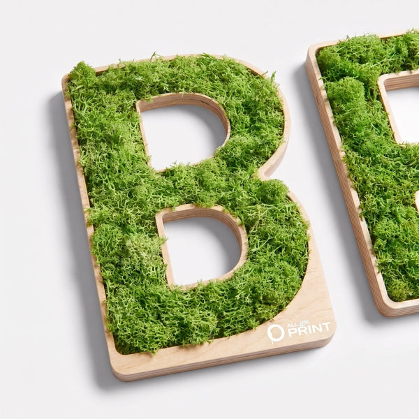 Individual letters made of moss
